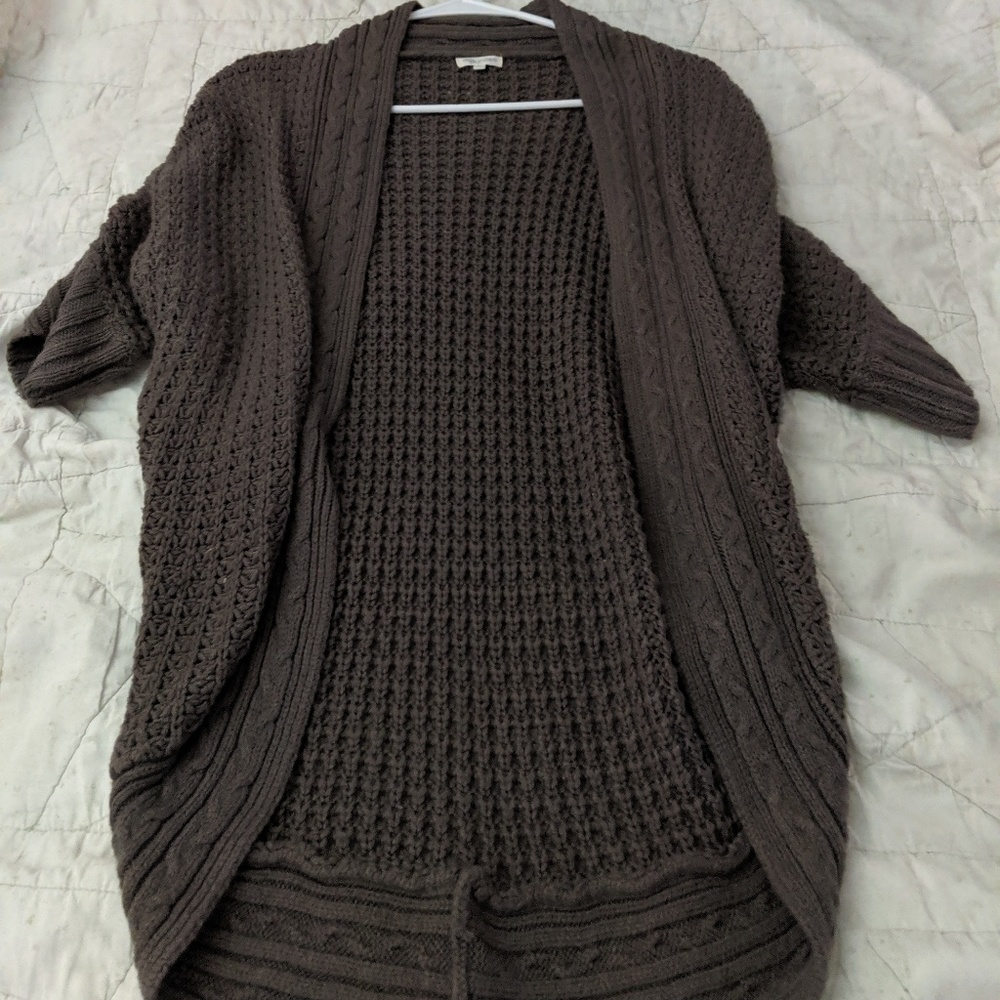 Maurice's grey sweater